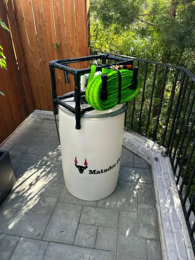 Matador Fire wildfire defense system barrel deployed at a residential property