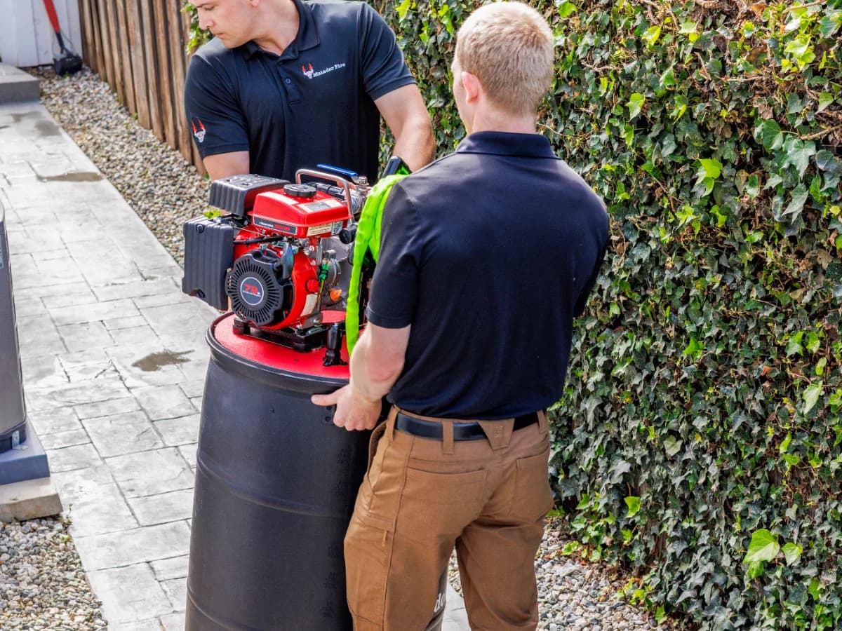 Matador Fire team installing wildfire defense system at a client home