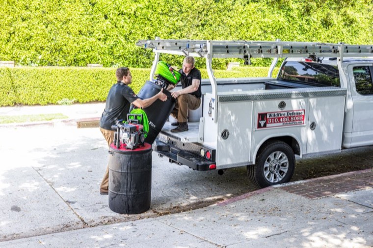 Matador Fire crew installing a home wildfire-defense system